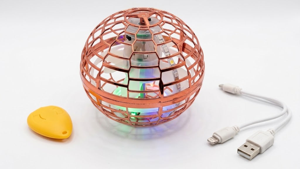 Qué incluye la caja: esfera voladora y cable de carga USB